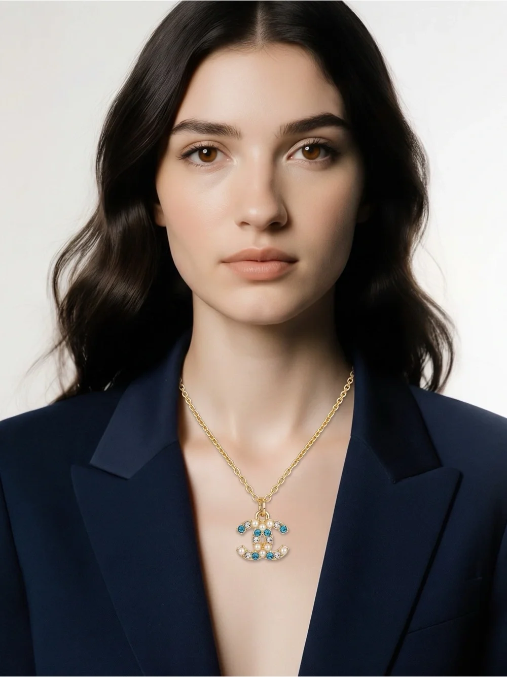 Gold Chain Necklace with Blue and Clear Gemstone Pendant